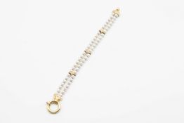 A CONTEMPORARY CULTURED PEARL AND DIAMOND BRACELET