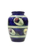 A WILLIAM MOORCROFT POTTERY VASE