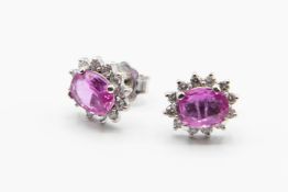 A PAIR OF PINK SAPPHIRE AND DIAMOND EARRINGS