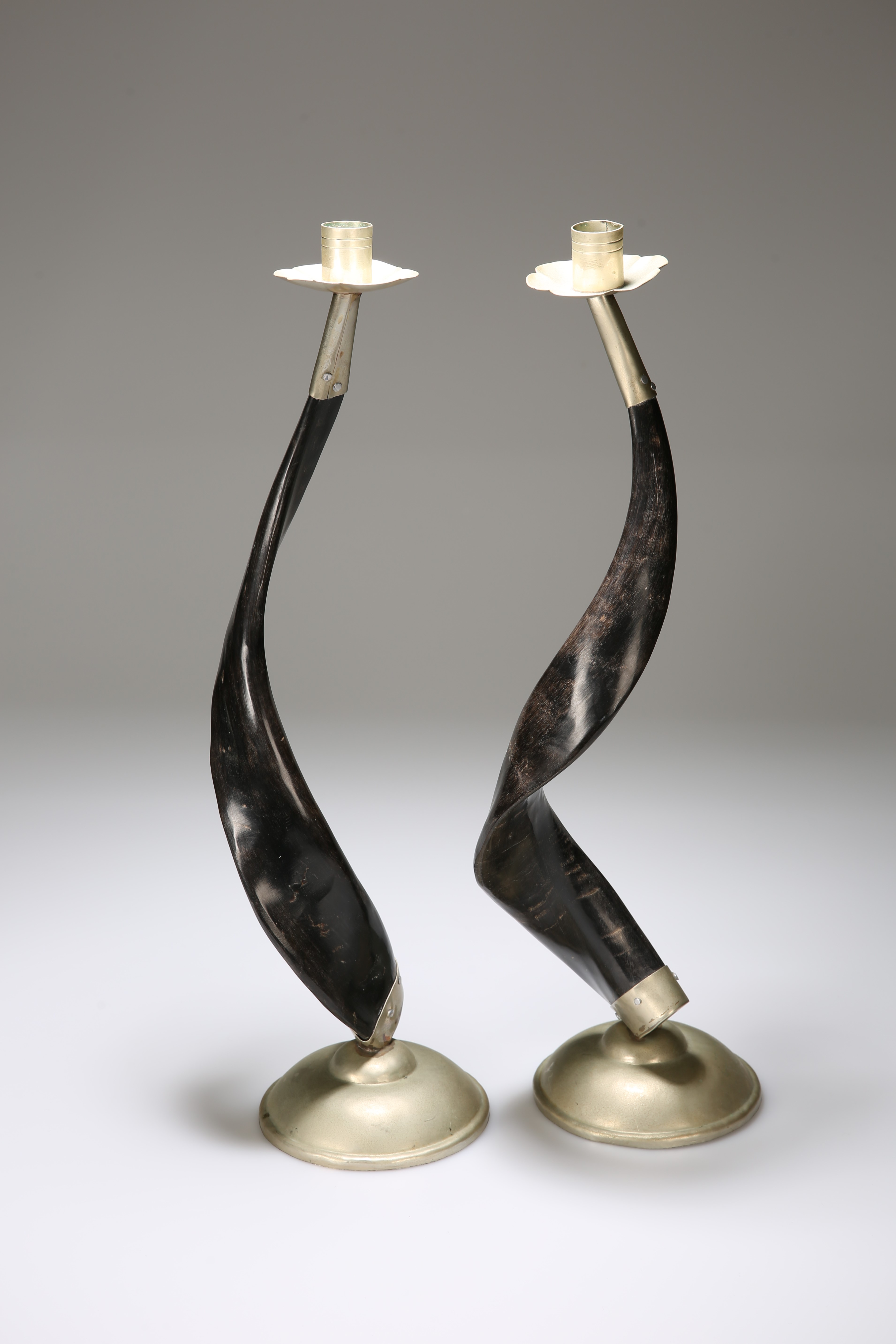 A LARGE PAIR OF WHITE METAL MOUNTED AND HORN CANDLESTICKS