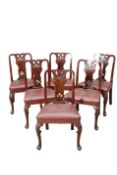 A SET OF SIX CHIPPENDALE STYLE MAHOGANY DINING CHAIRS