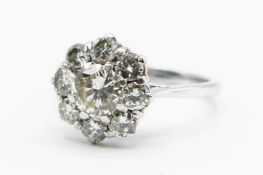 AN 18CT WHITE GOLD AND DIAMOND RING