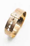 A 9CT YELLOW GOLD BACK AND FRONT BANGLE BY HENRY GRIFFITHS & SONS