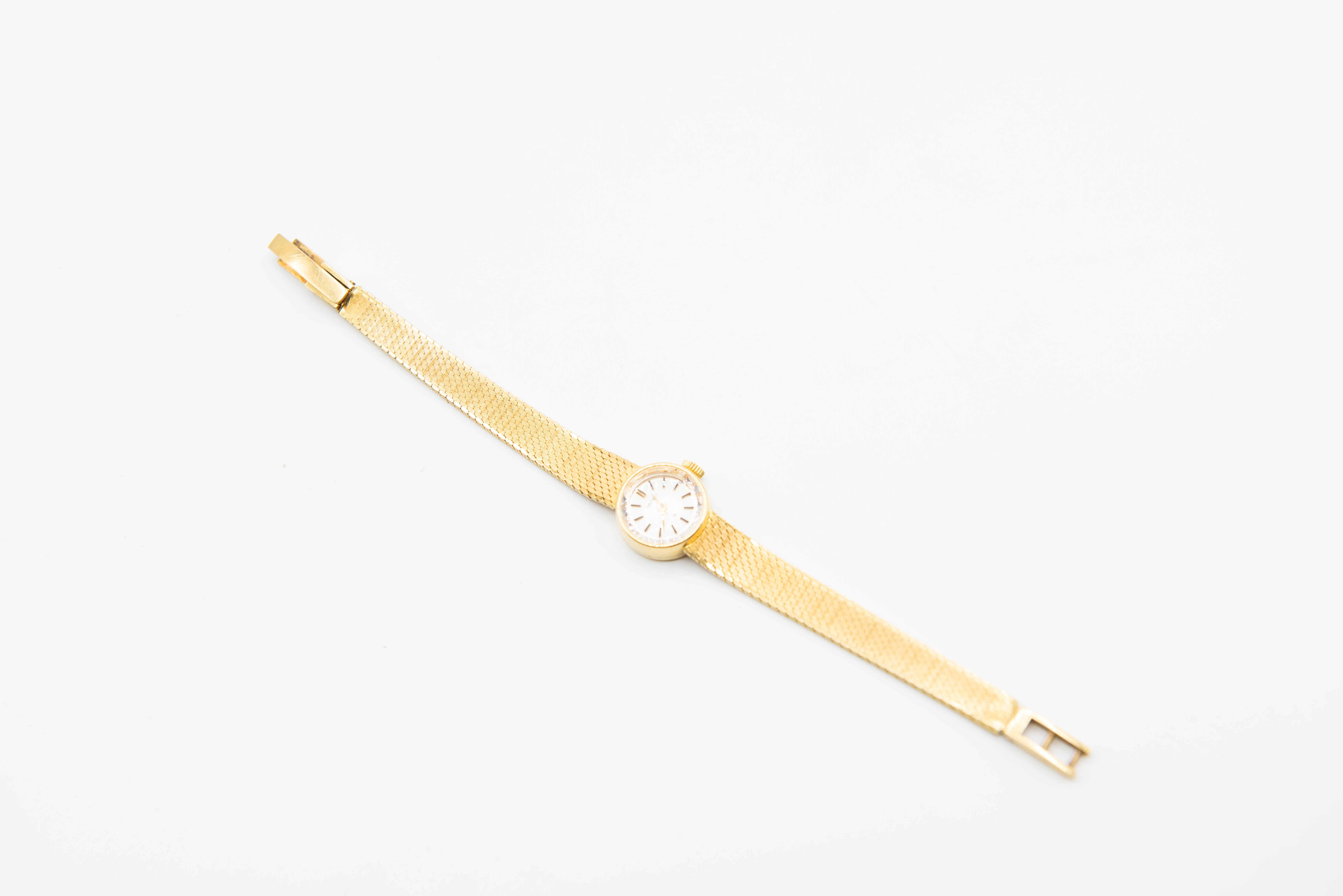 LADY'S 18 CARAT GOLD SEIKO BRACELET WATCH.