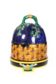 A MAJOLICA CHEESE DOME AND UNDERPLATE