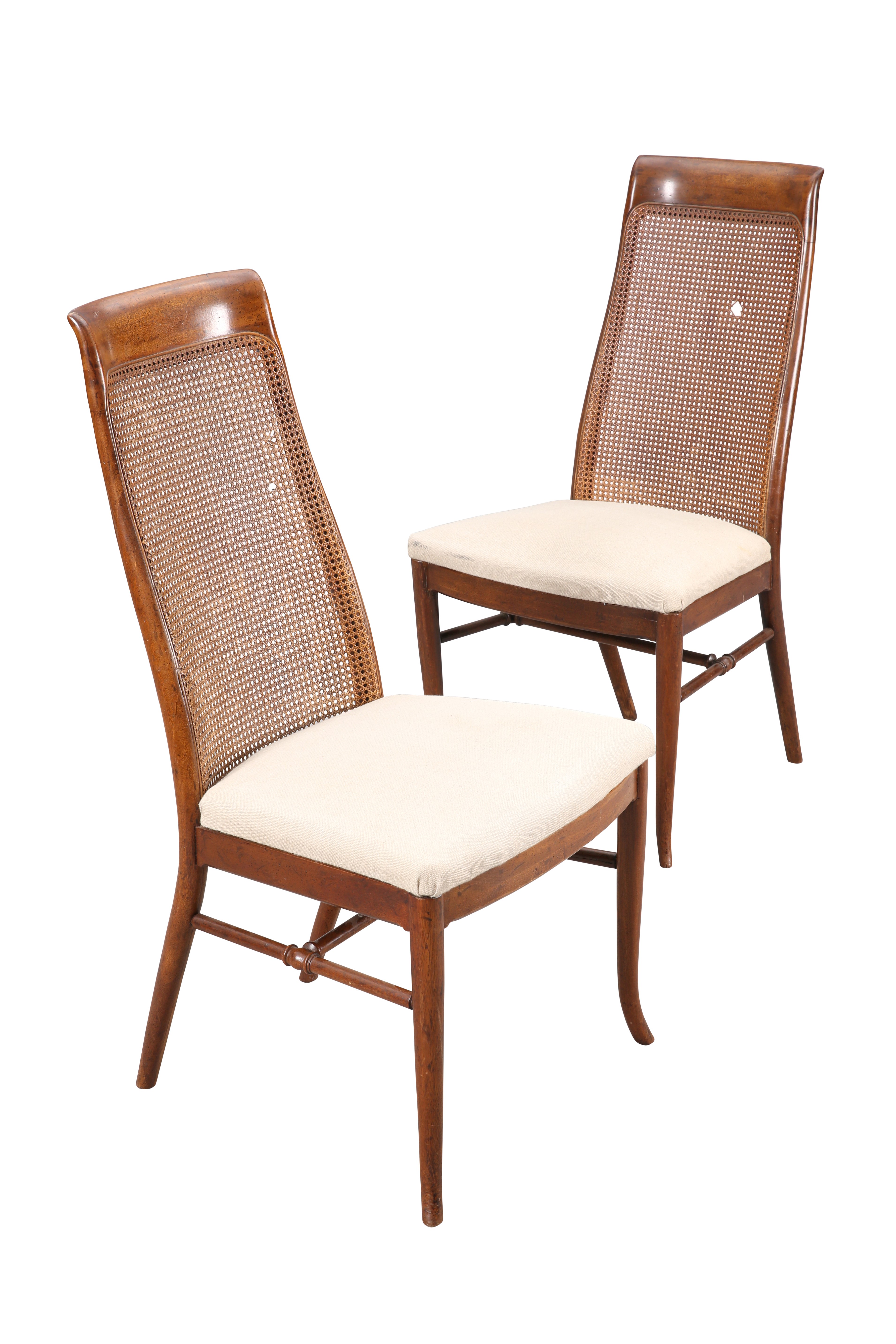 A PAIR OF SCOTTISH STAINED BEECH AND CANEWORK CHAIRS