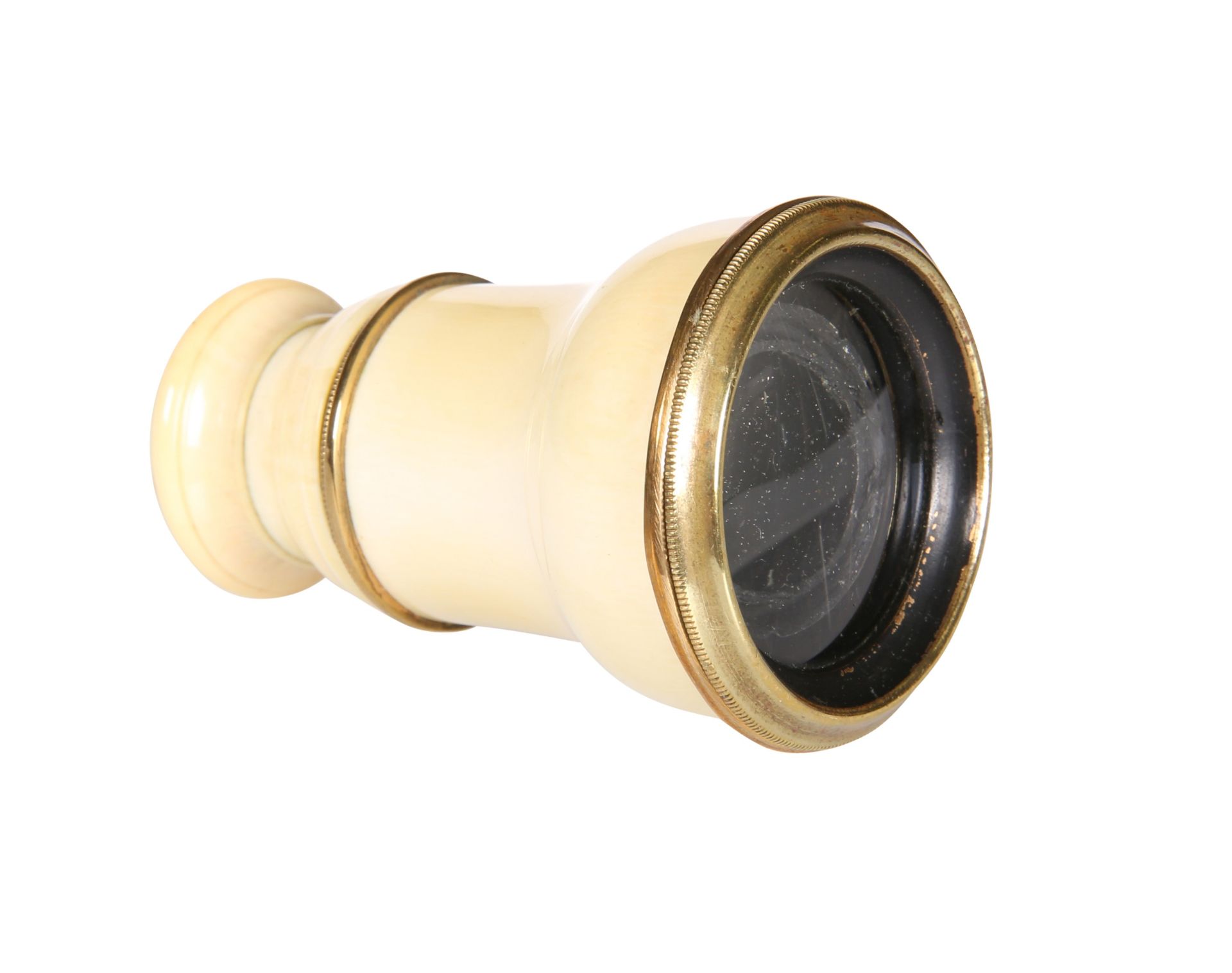 A VICTORIAN IVORY AND BRASS MONOCLE