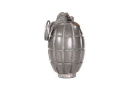 A WWII BRITISH MILLS GRENADE, 36M, MK1, deactivated.