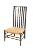 A LIBERTY & CO RUSH SEATED NURSING CHAIR