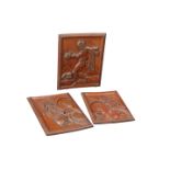 A SET OF THREE SOUTH AMERICAN CARVED WOODEN PANELS