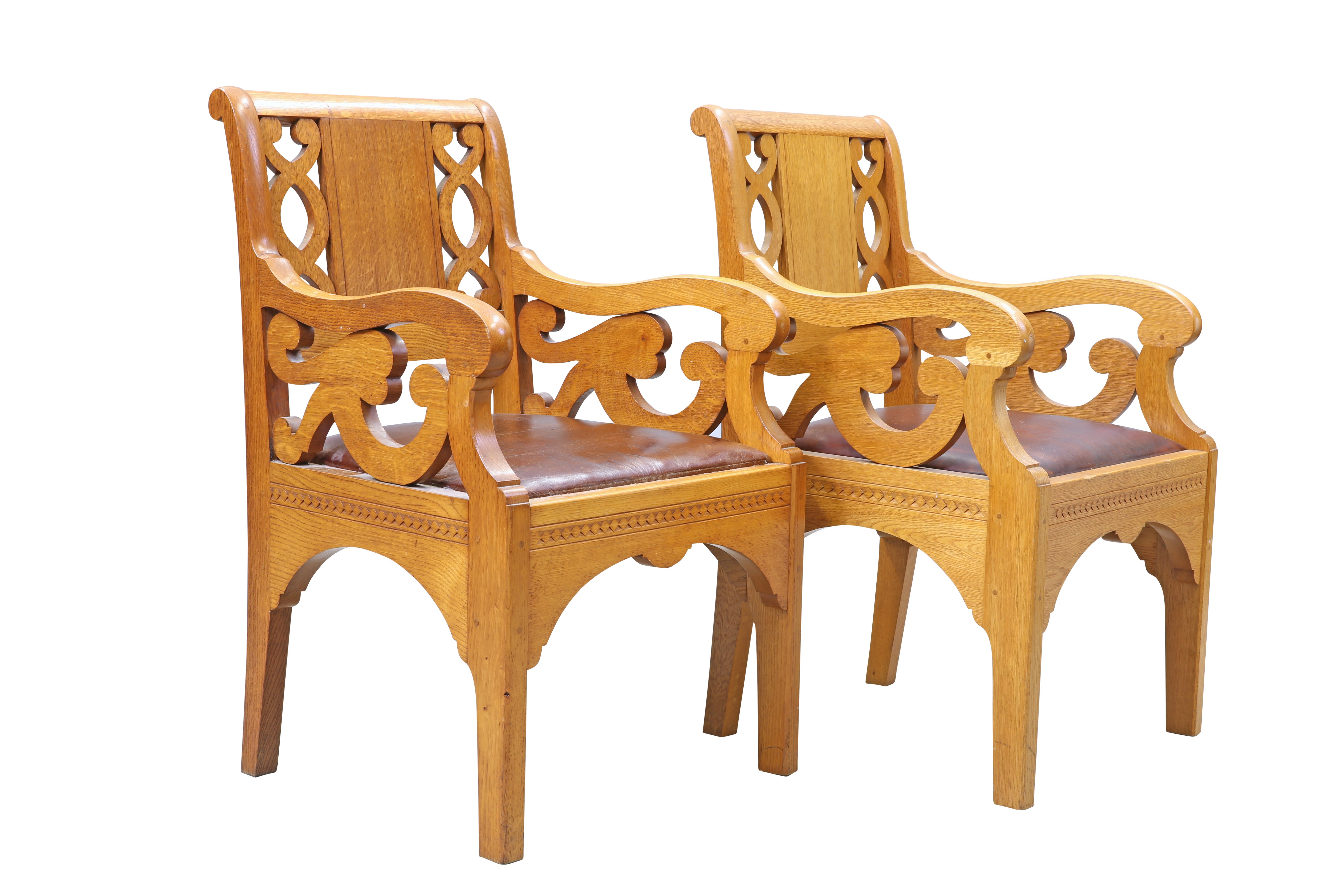 A PAIR OF GOLDEN OAK ARMCHAIRS, POSSIBLY BY ARTHUR ROMNEY GREEN