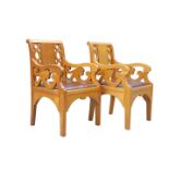 A PAIR OF GOLDEN OAK ARMCHAIRS, POSSIBLY BY ARTHUR ROMNEY GREEN