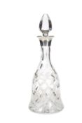 A SILVER-MOUNTED CUT-GLASS BELL DECANTER