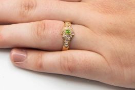 A LATE 19TH CENTURY DEMANTOID GARNET AND DIAMOND RING