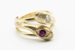 A DIAMOND AND RUBY SET SNAKE RING