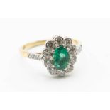 AN 18CT YELLOW GOLD EMERALD AND DIAMOND RING