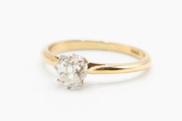 AN 18CT YELLOW GOLD AND DIAMOND RING