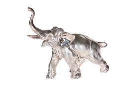 A LARGE SILVER FILLED MODEL OF AN ELEPHANT