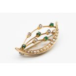 A SEED PEARL, EMERALD AND DIAMOND SET BROOCH