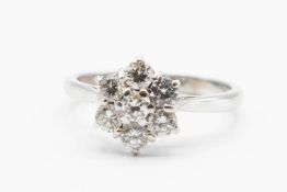 A BOODLES 18CT WHITE GOLD AND DIAMOND RING