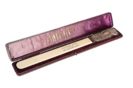 HUNTING INTEREST: A LARGE VICTORIAN SILVER-MOUNTED IVORY PAGE TURNER