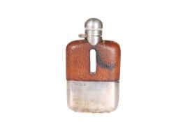A SMALL GEORGE VI SILVER-MOUNTED AND LEATHER-COVERED HIP FLASK, HALLMARKED FOR SHEFFIELD 1942