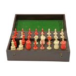 A STAINED AND NATURAL BONE BARLEYCORN PATTERN CHESS SET