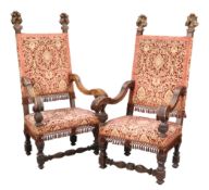 A LARGE PAIR OF GILDED AND CARVED "THRONES"