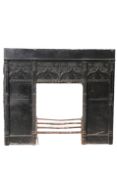 A LARGE CAST IRON FIRE SURROUND BY THOMAS ELSLEY & SON