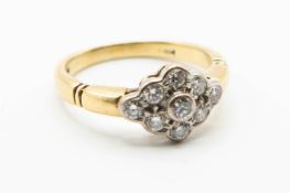 AN 18CT YELLOW GOLD AND DIAMOND RING