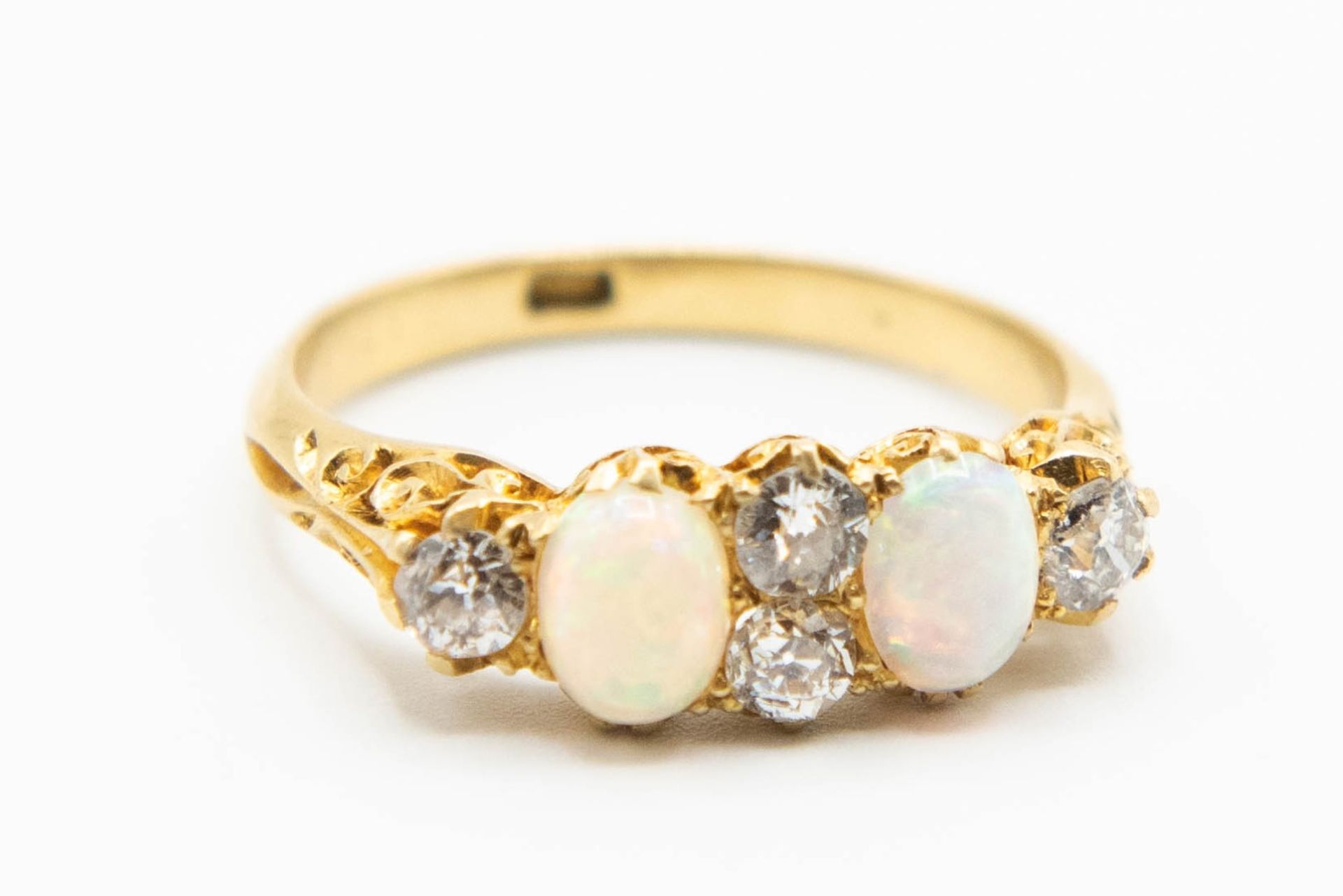 A LATE VICTORIAN 18CT YELLOW GOLD OPAL AND DIAMOND RING