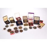 TWENTY-TWO CASED AND LOOSE MEDALS