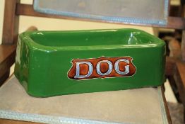 A GREEN-GLAZED DOG BOWL, c.1900