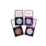 FOUR CASED MEDALS