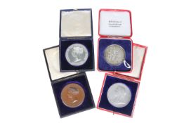 FOUR CASED MEDALS