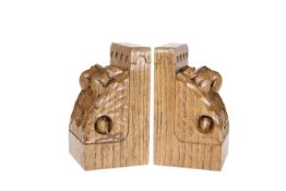 A PAIR OF MOUSEMAN OAK TRIPLE MOUSE BOOKENDS