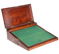 AN EARLY 19TH CENTURY MAHOGANY AND BRASS-BOUND CAMPAIGN TRAVELLING DESK