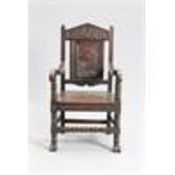 A 17TH CENTURY STYLE OAK WAINSCOT CHAIR