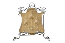 AN ARTS AND CRAFTS BRASS AND WROUGHT IRON FIRESCREEN