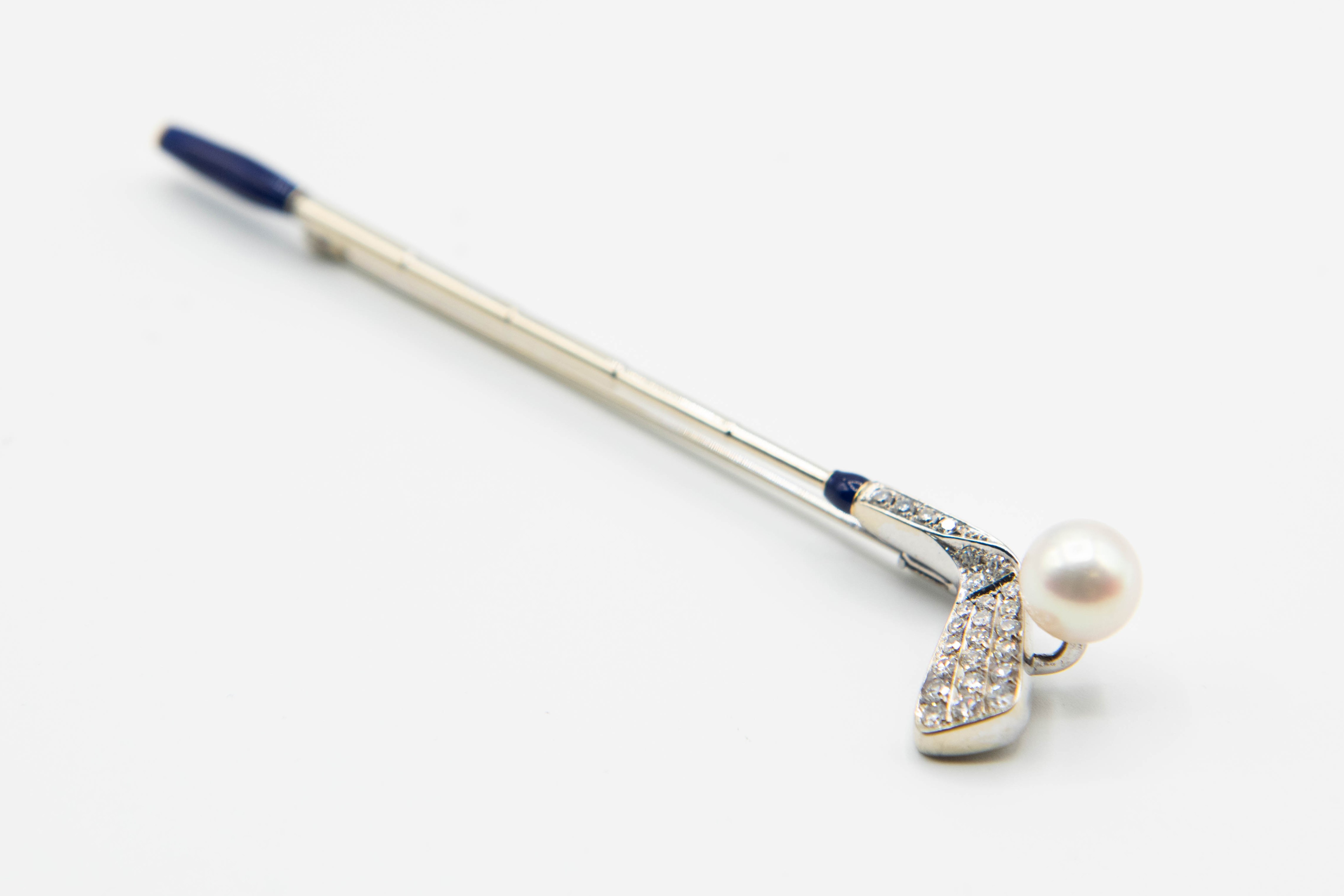 A DIAMOND AND CULTURED PEARL BROOCH