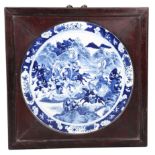 A CHINESE BLUE AND WHITE PORCELAIN WALL PLAQUE