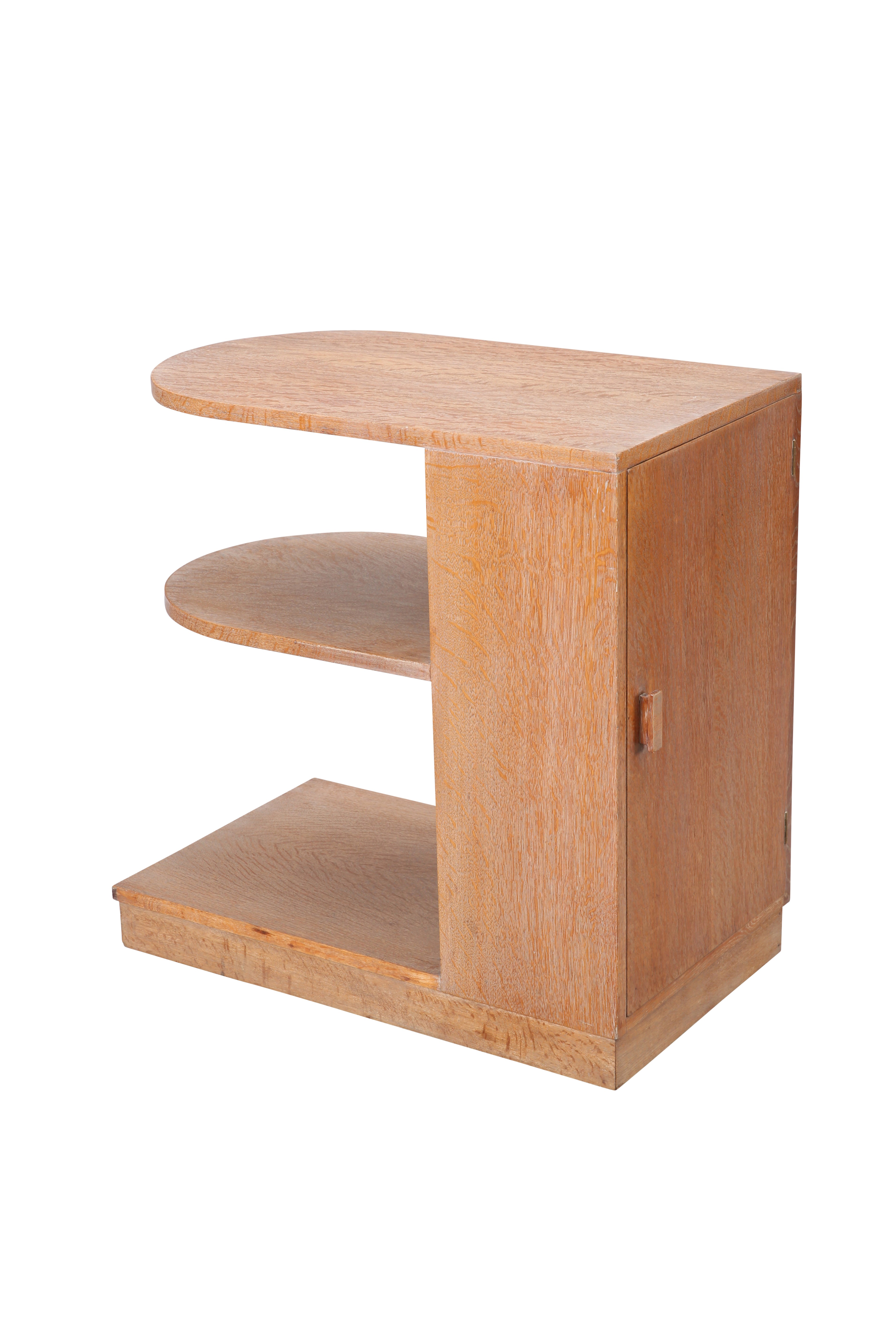 A HEALS LIMED OAK COMBINATION BOOKCASE TABLE