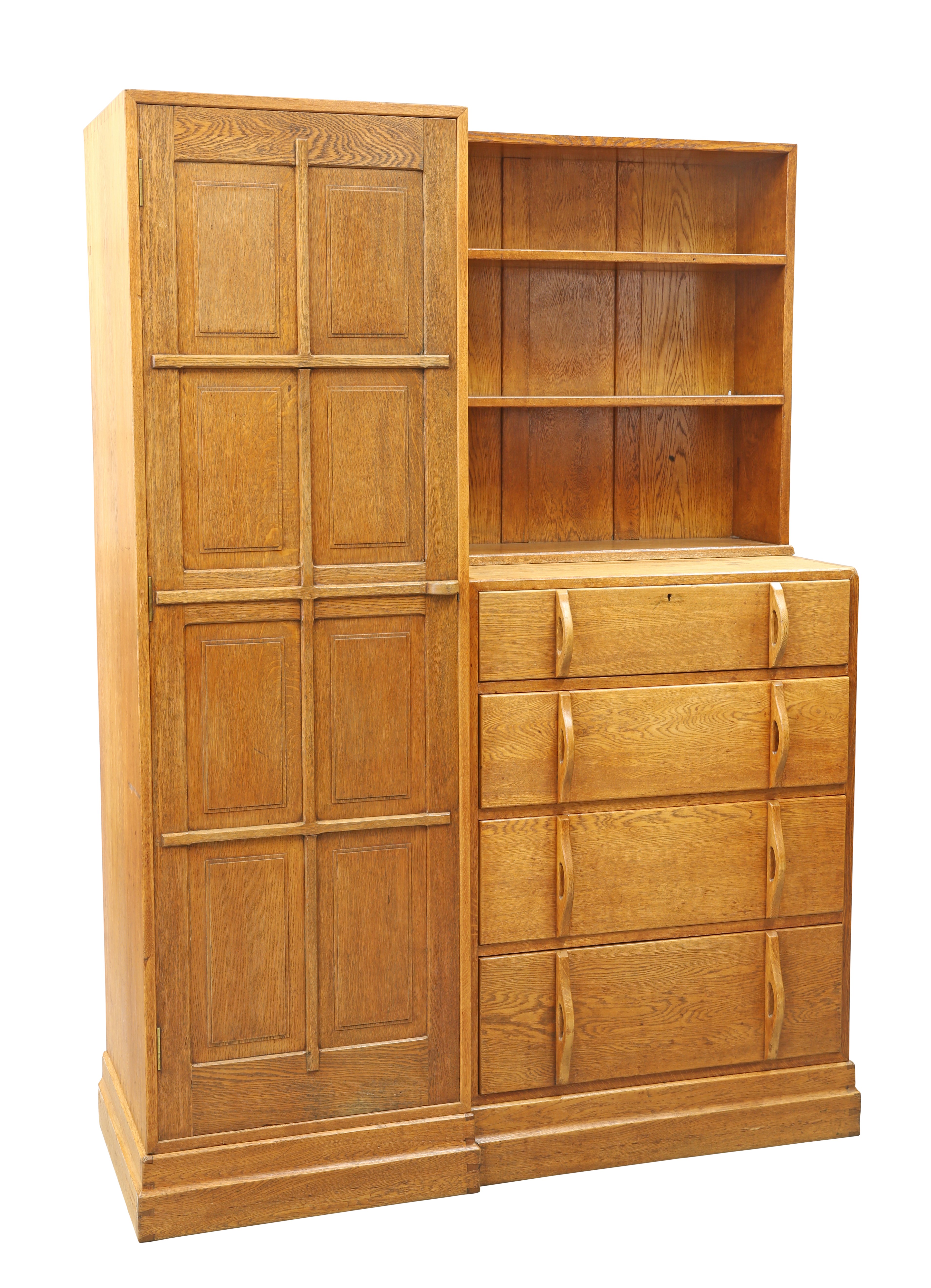 A COTSWOLD SCHOOL OAK COMBINATION WARDROBE