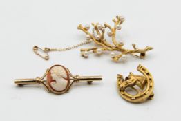 A COLLECTION OF THREE 9CT YELLOW GOLD BROOCHES