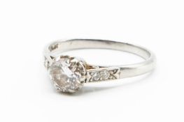 A PLATINUM AND DIAMOND RING