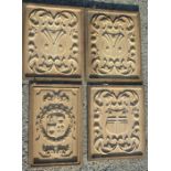 A SET OF FOUR OAK PANELS CARVED WITH A COAT OF ARMS