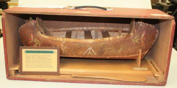 A CASED SCALE MODEL OF A NORTH AMERICAN INDIAN BIRCH BARK CANOE