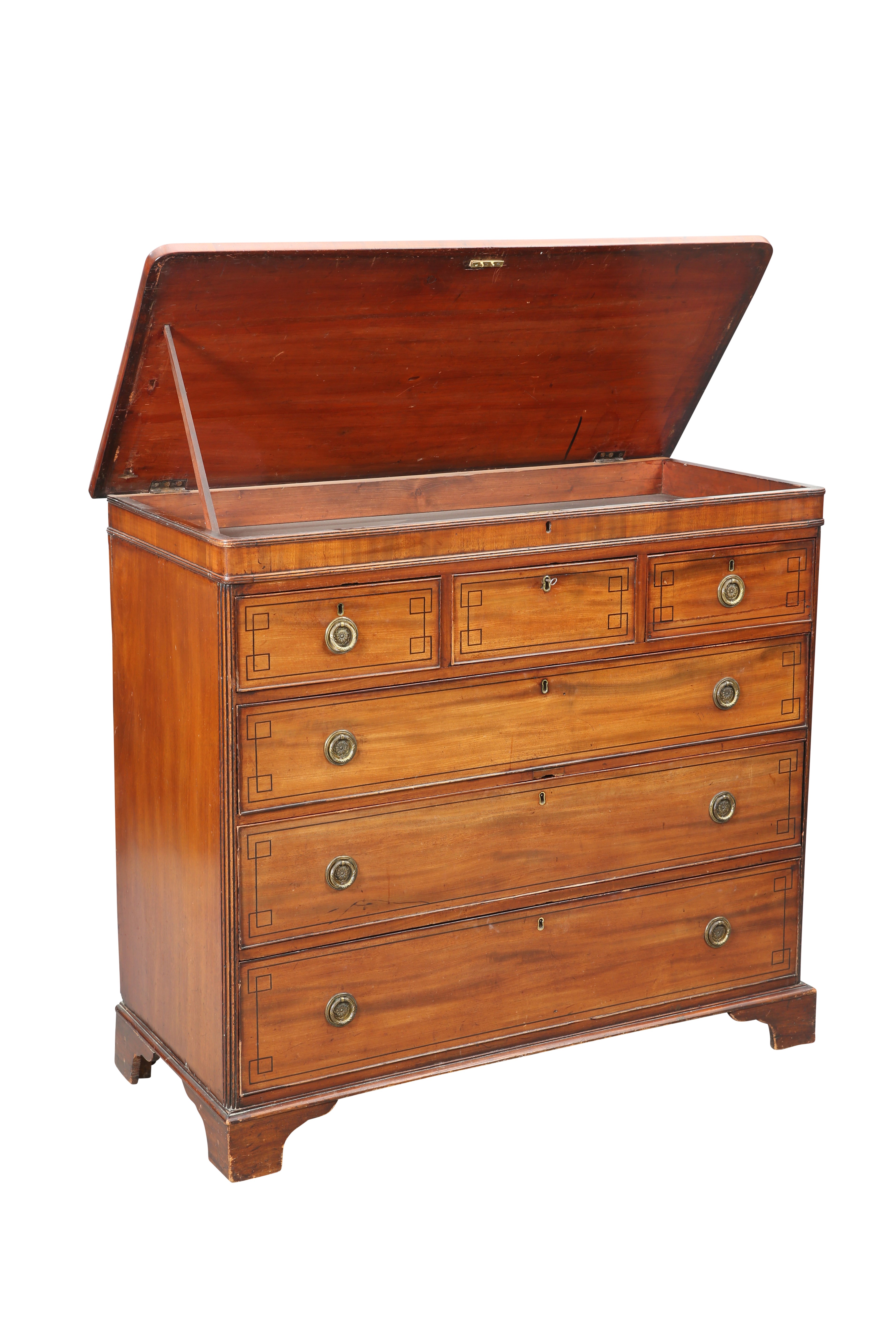 A REGENCY MAHOGANY CHEST OF DRAWERS WITH HINGED TOP