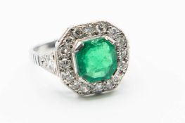 A COLOMBIAN EMERALD AND DIAMOND RING