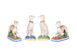 TWO PAIRS OF CONTINENTAL BISQUE PORCELAIN MODELS OF GREYHOUNDS